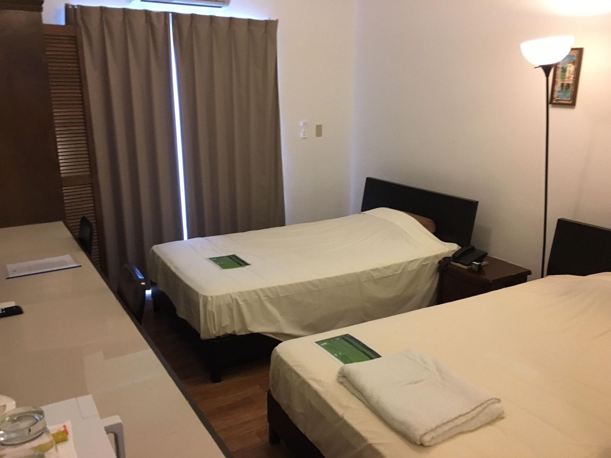 Himawari Hotel Garapan Bagian luar foto